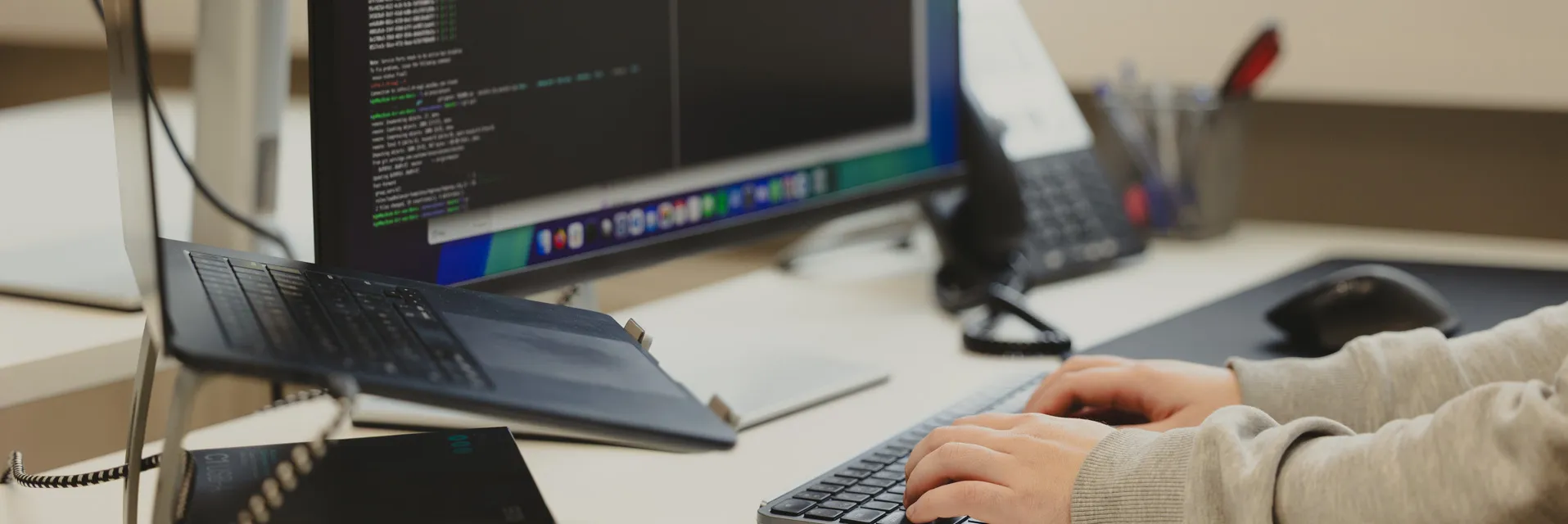 Background showing people working in an office